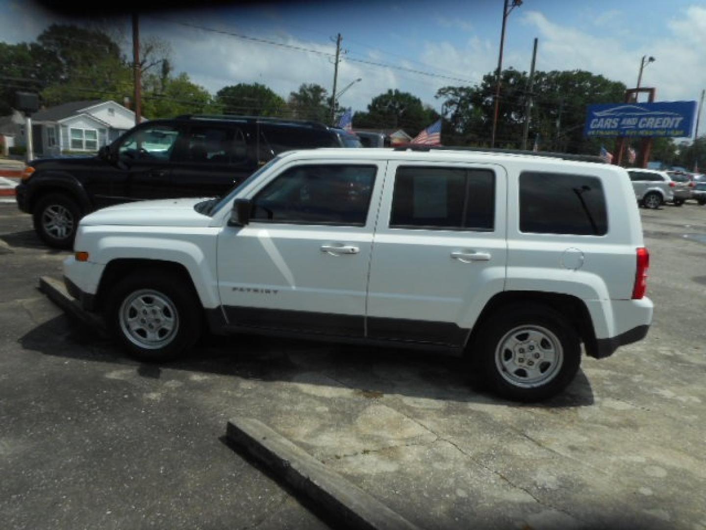 2013 WHITE JEEP PATRIOT SPORT (1C4NJPBA5DD) , located at 1200 Cassat Avenue, Jacksonville, FL, 32205, (904) 695-1885, 30.302404, -81.731033 - Photo#1